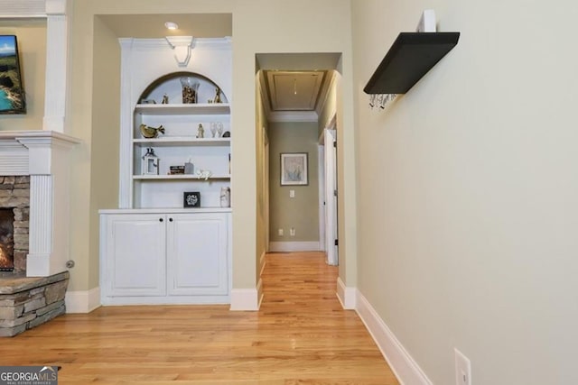87 Marcus Ct, Ball Ground, GA 30107 - corridor with attic access, light wood-style flooring, and built in shelves
