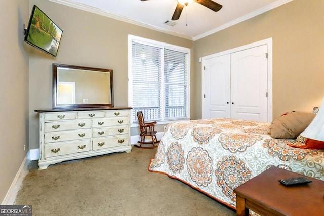 87 Marcus Ct, Ball Ground, GA 30107 - carpeted bedroom with crown molding, a closet, and a ceiling fan