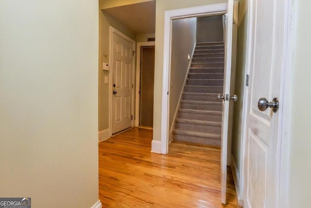 87 Marcus Ct, Ball Ground, GA 30107 - staircase with wood finished floors and baseboards