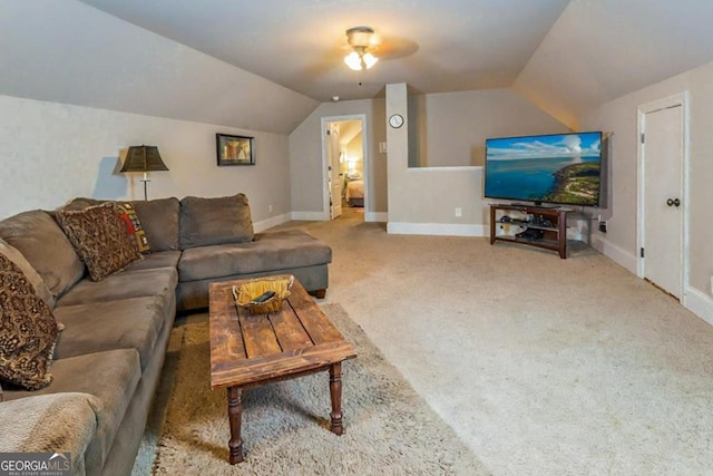 87 Marcus Ct, Ball Ground, GA 30107 - carpeted living room featuring lofted ceiling and baseboards