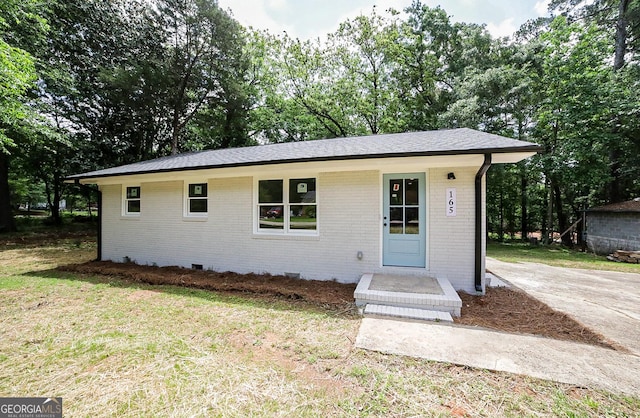 165 Dowdy Rd, Athens, GA 30606 - view of front of house with brick siding, a front lawn, crawl space, and roof with shingles