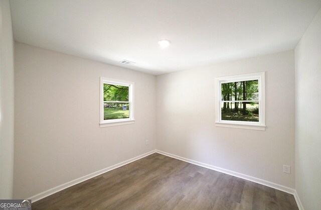 165 Dowdy Rd, Athens, GA 30606 - empty room with dark wood-type flooring and baseboards