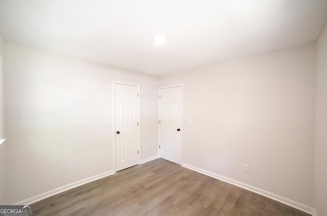 165 Dowdy Rd, Athens, GA 30606 - unfurnished room featuring baseboards, wood finished floors, and recessed lighting