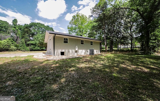 165 Dowdy Rd, Athens, GA 30606 - back of house with cooling unit, a yard, and brick siding