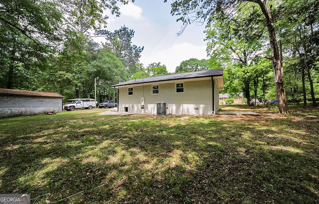 165 Dowdy Rd, Athens, GA 30606 - back of property featuring central AC and a lawn