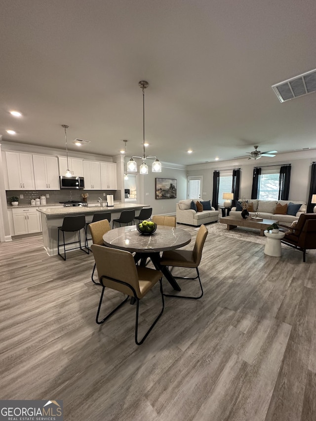 3006 Fairway Dr, Villa Rica, GA 30180 - dining room featuring light wood-type flooring, recessed lighting, and ceiling fan