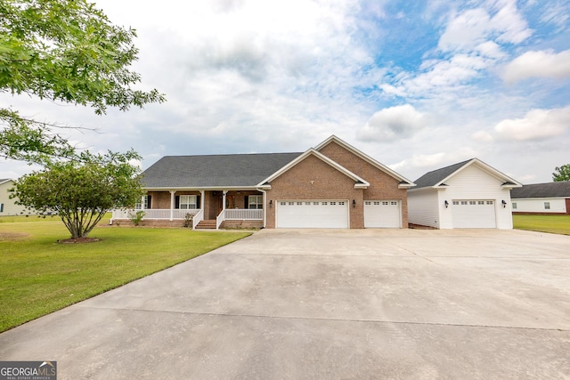 ranch-style home with covered porch, brick siding, an attached garage, concrete driveway, and a front lawn