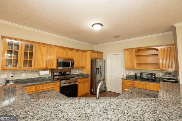 kitchen featuring stainless steel appliances, decorative backsplash, ornamental molding, open shelves, and dark stone counters