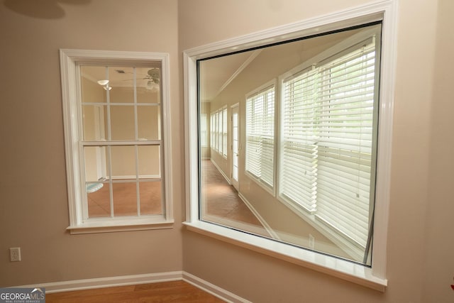 spare room with baseboards