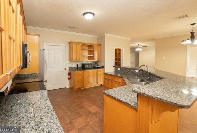 kitchen featuring a sink, open shelves, stainless steel appliances, crown molding, and a spacious island