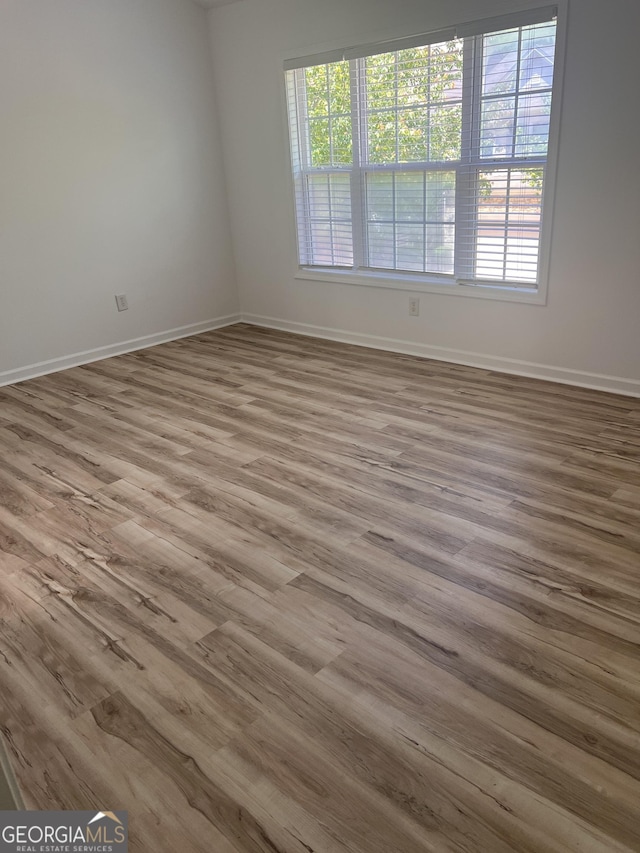 4540 Cold Spring Ct, Cumming, GA 30041 - unfurnished room featuring baseboards and wood finished floors