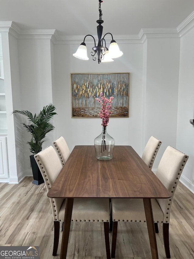 4540 Cold Spring Ct, Cumming, GA 30041 - dining room with a chandelier, light wood finished floors, crown molding, and baseboards