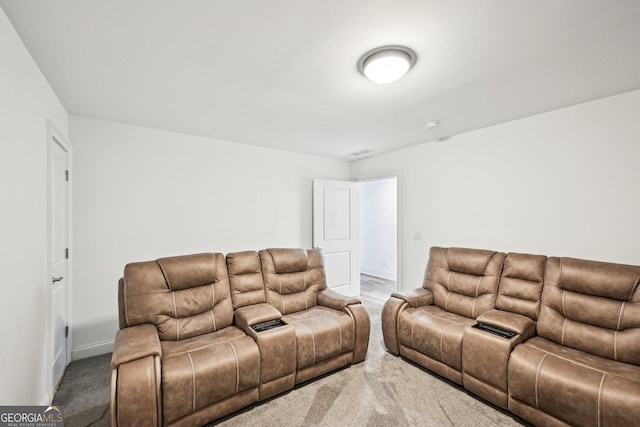 3991 Perry Pass, Lithonia, GA 30038 - carpeted living area featuring baseboards