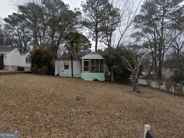 2010 Mcafee Pl, Decatur, GA 30032 - view of yard featuring a sunroom and central AC