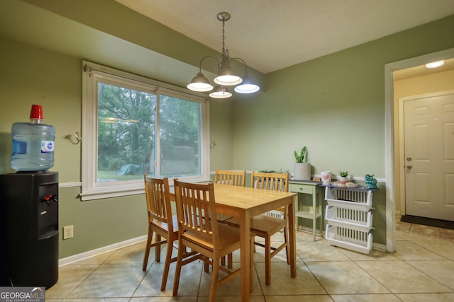 2368 Ellis Ct, Snellville, GA 30078 - dining space featuring light tile patterned floors and a chandelier