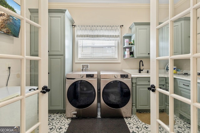 11 Main St, Newnan, GA 30263 - washroom with cabinet space, washing machine and clothes dryer, french doors, and ornamental molding