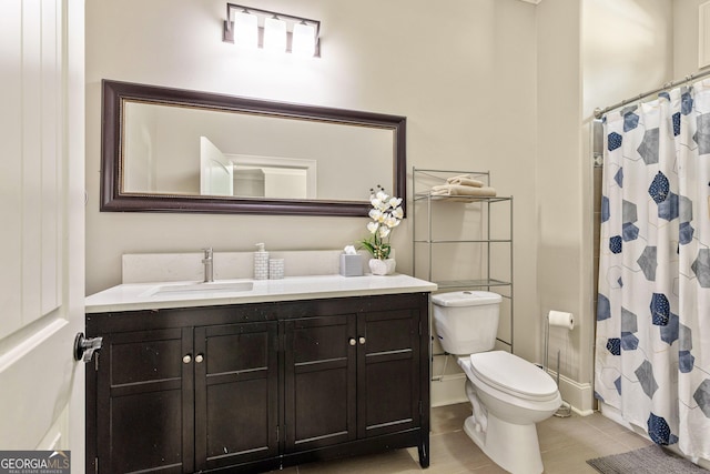 11 Main St, Newnan, GA 30263 - full bathroom with toilet, vanity, tile patterned floors, and a shower with curtain