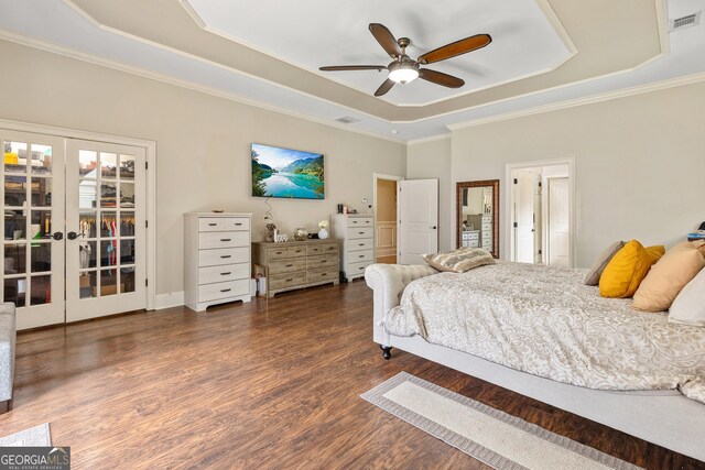 11 Main St, Newnan, GA 30263 - bedroom featuring a tray ceiling, french doors, wood finished floors, ornamental molding, and a ceiling fan