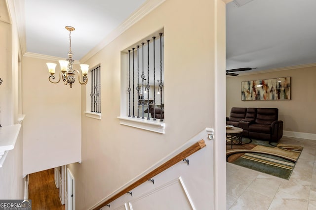 11 Main St, Newnan, GA 30263 - staircase featuring crown molding, a chandelier, and ceiling fan