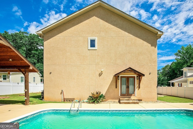11 Main St, Newnan, GA 30263 - view of swimming pool with french doors and a patio area