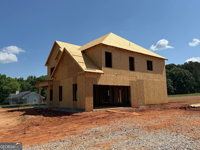 view of side of property featuring a garage