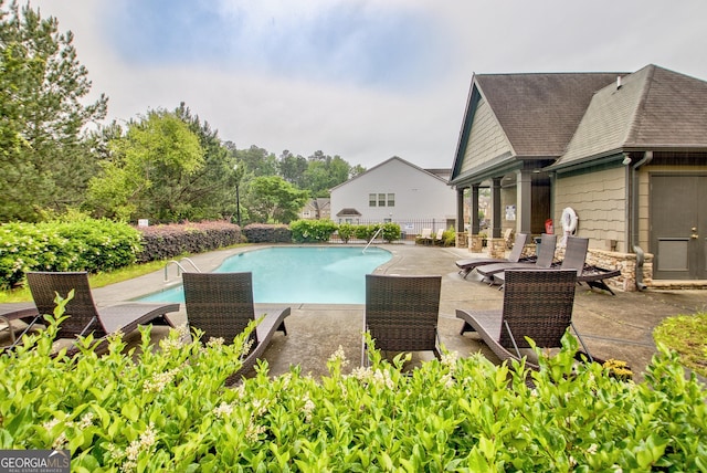 view of pool with a patio