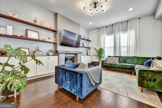 4760 Highside Way, Smyrna, GA 30082 - living area with a chandelier, dark wood-style flooring, a glass covered fireplace, and recessed lighting