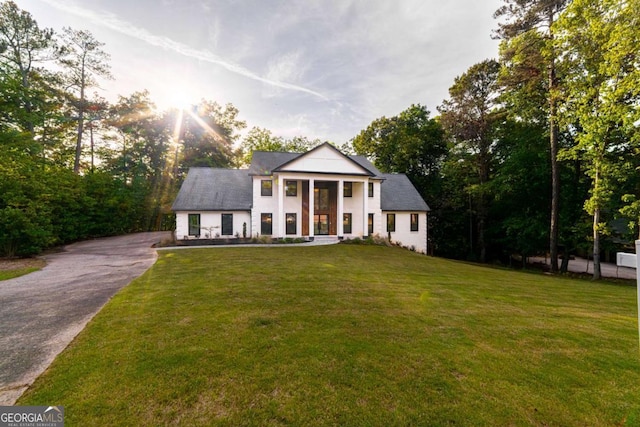 4 Bentley Trace Mnr, Atlanta, GA 30327 - neoclassical / greek revival house featuring a front lawn and asphalt driveway