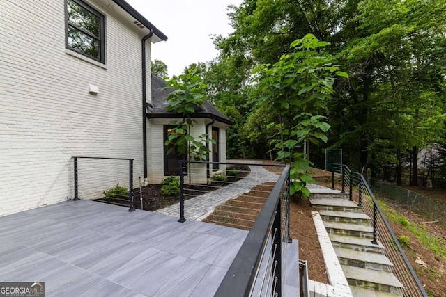 4 Bentley Trace Mnr, Atlanta, GA 30327 - wooden deck featuring stairway