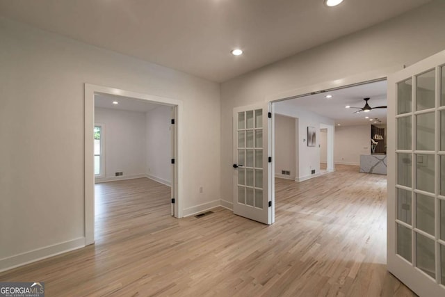 4 Bentley Trace Mnr, Atlanta, GA 30327 - spare room featuring french doors, light wood-type flooring, ceiling fan, and recessed lighting