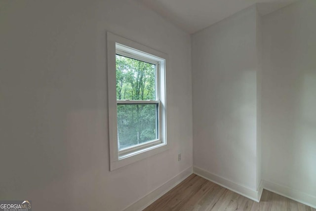 4 Bentley Trace Mnr, Atlanta, GA 30327 - unfurnished room with light wood-style flooring and baseboards