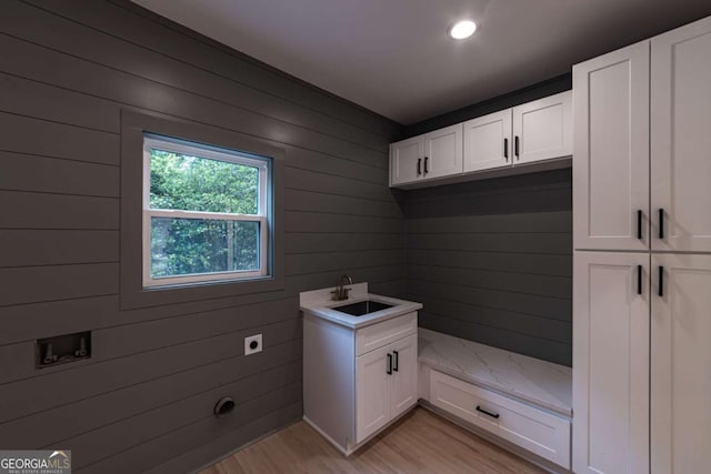 4 Bentley Trace Mnr, Atlanta, GA 30327 - mudroom featuring light wood finished floors, wooden walls, and recessed lighting