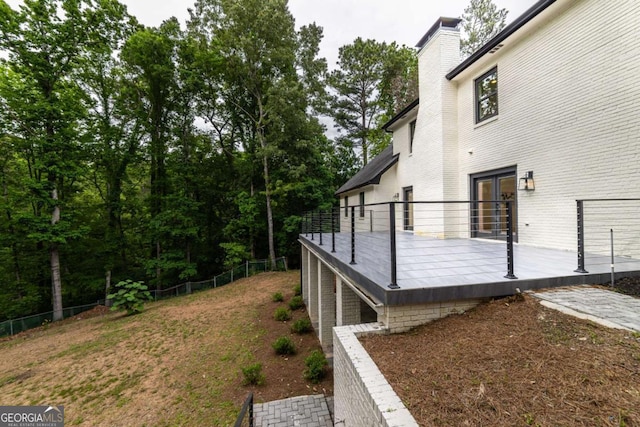 4 Bentley Trace Mnr, Atlanta, GA 30327 - view of yard with french doors and a deck
