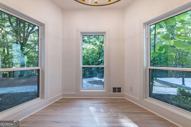 4 Bentley Trace Mnr, Atlanta, GA 30327 - unfurnished room with light wood-style flooring and baseboards