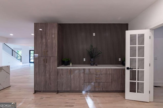 4 Bentley Trace Mnr, Atlanta, GA 30327 - kitchen with light wood-type flooring, light countertops, recessed lighting, and modern cabinets