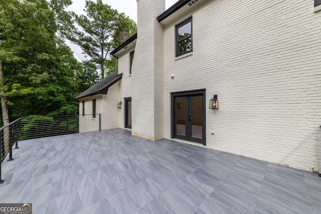 4 Bentley Trace Mnr, Atlanta, GA 30327 - view of patio featuring french doors
