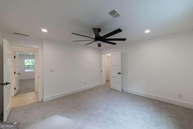 4 Bentley Trace Mnr, Atlanta, GA 30327 - unfurnished bedroom with light carpet, recessed lighting, and ceiling fan