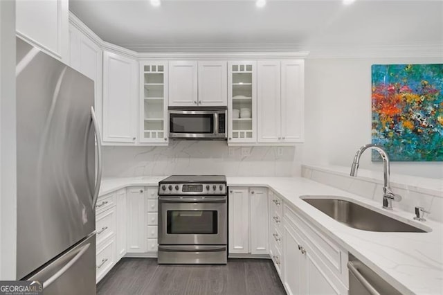 2499 Peachtree Rd NE Unit 503, Atlanta, GA 30305 - kitchen with stainless steel appliances, a sink, and white cabinets