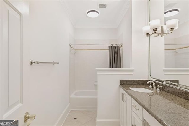 2499 Peachtree Rd NE Unit 503, Atlanta, GA 30305 - bathroom with ornamental molding, vanity, shower / bath combination, tile patterned floors, and baseboards