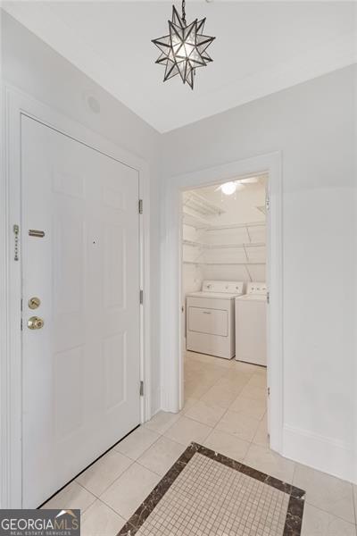 2499 Peachtree Rd NE Unit 503, Atlanta, GA 30305 - entrance foyer featuring washing machine and dryer