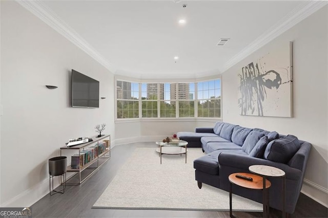 2499 Peachtree Rd NE Unit 503, Atlanta, GA 30305 - living room with crown molding, wood finished floors, and baseboards