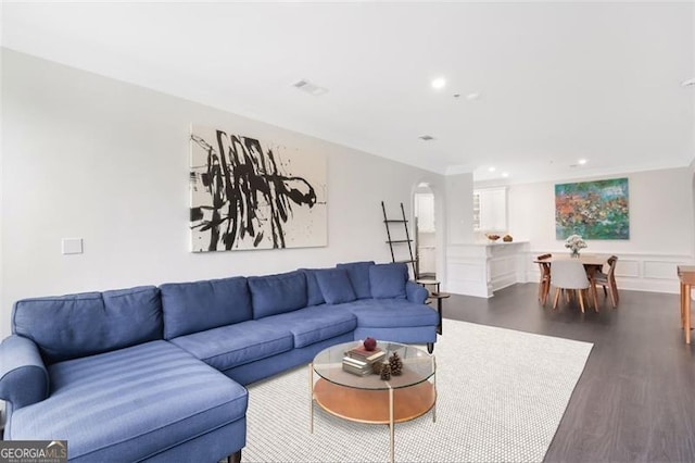 2499 Peachtree Rd NE Unit 503, Atlanta, GA 30305 - living room with dark wood-style flooring, arched walkways, and recessed lighting