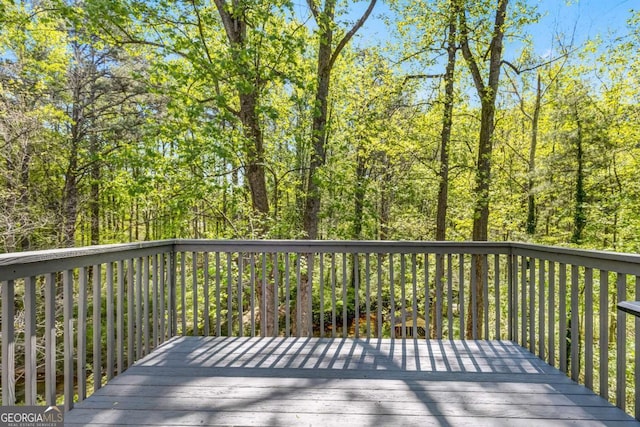 4027 Mount Vernon Dr, Woodstock, GA 30189 - wooden terrace with a wooded view