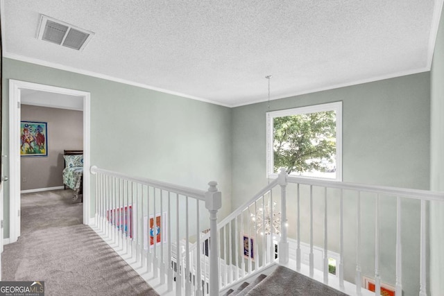 4027 Mount Vernon Dr, Woodstock, GA 30189 - hall featuring carpet, ornamental molding, a textured ceiling, an upstairs landing, and baseboards
