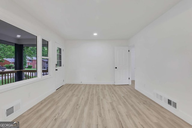 644 Church St NW, Atlanta, GA 30318 - unfurnished room featuring wood finished floors and recessed lighting
