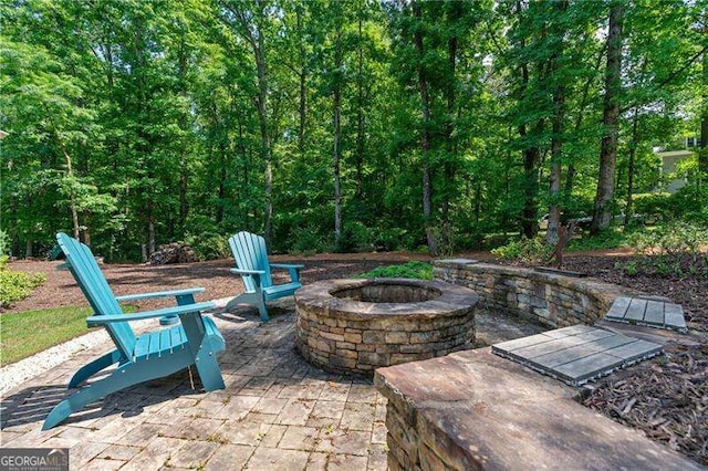 view of patio featuring a fire pit