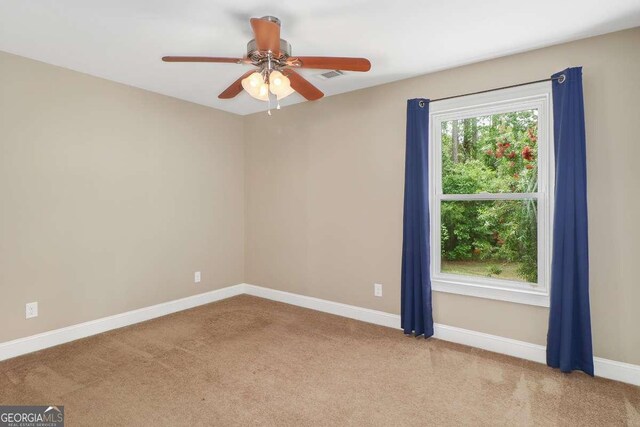 220 Candleberry Way, Guyton, GA 31312 - carpeted empty room with baseboards and a ceiling fan