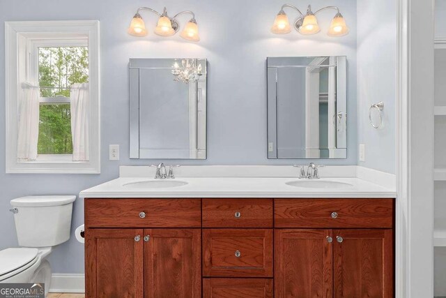 220 Candleberry Way, Guyton, GA 31312 - bathroom featuring double vanity and toilet