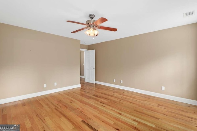 220 Candleberry Way, Guyton, GA 31312 - empty room with light wood-style floors, baseboards, and a ceiling fan