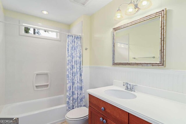 220 Candleberry Way, Guyton, GA 31312 - full bath featuring a wainscoted wall, toilet, vanity, and shower / tub combo